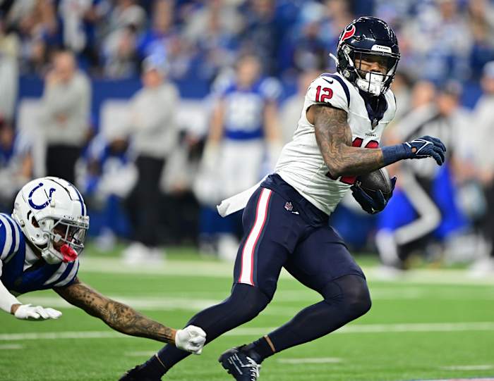 Colts receiver Nico Collins scores on a 75-yard touchdown on Houston's first offensive play of the game during their win over Indianapolis in Week 18.
